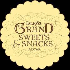 The Grand Sweets and Snacks logo